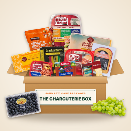 The Charcuterie Box: cheeses, deli meats, salami, mixed nuts, crackers, grapes and blueberries in an open Jahmaxx box