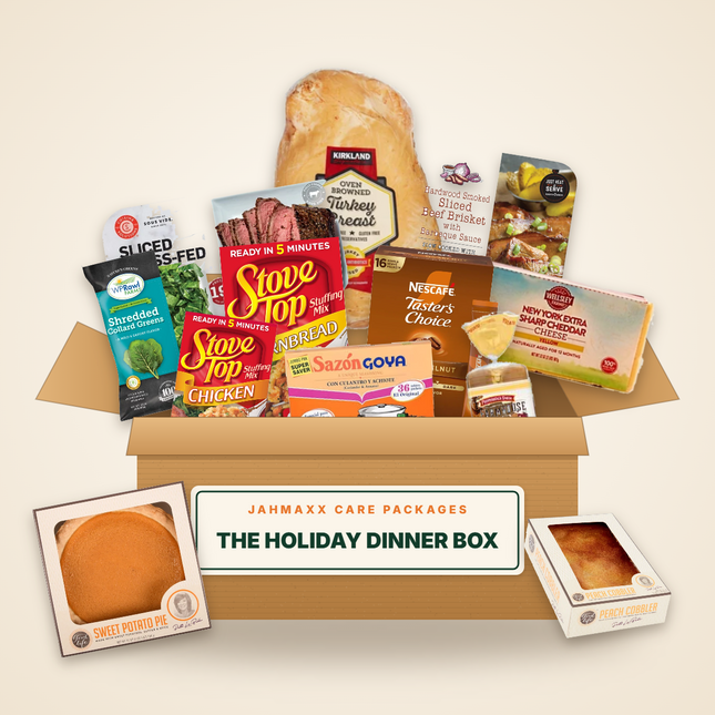 The Holiday Dinner Box: turkey breast, roast beef, brisket, stuffing, collards, cheddar, pies and more in an open Jahmaxx box