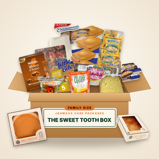 The Sweet Tooth Box, Family Size: cakes, brownies, muffins, Jamaican buns, pies and cobbler in an open Jahmaxx box